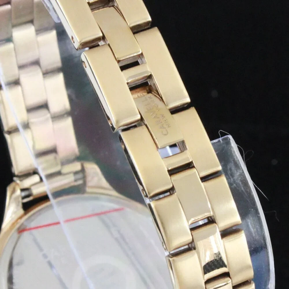Caravelle New York Ladies Casual Watch Swarovski Crystal Bezel Gold Tone 37mm